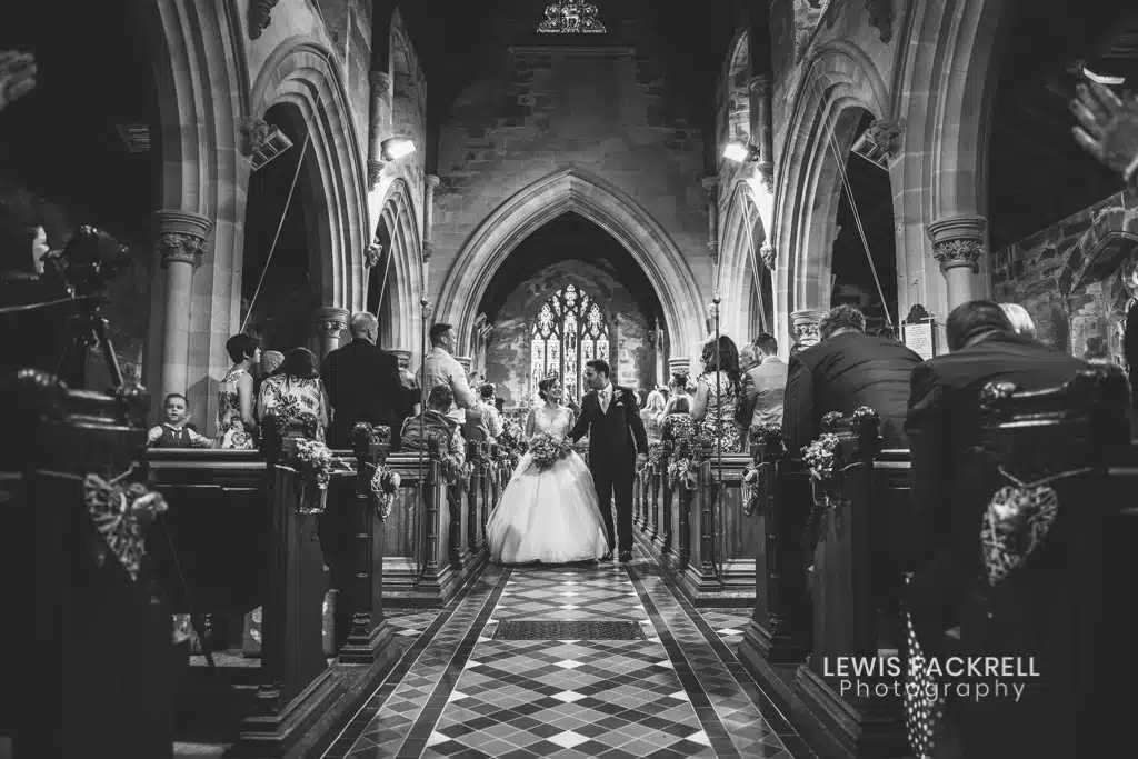 Un-plugged wedding image of camera in church