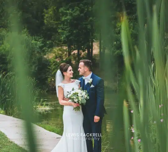 Canada lodge & lake wedding photography of couple during their portraits