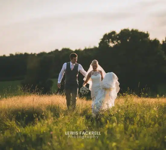 Abi & Chris Celebrating their wedding at Canada Lodge near cardiff