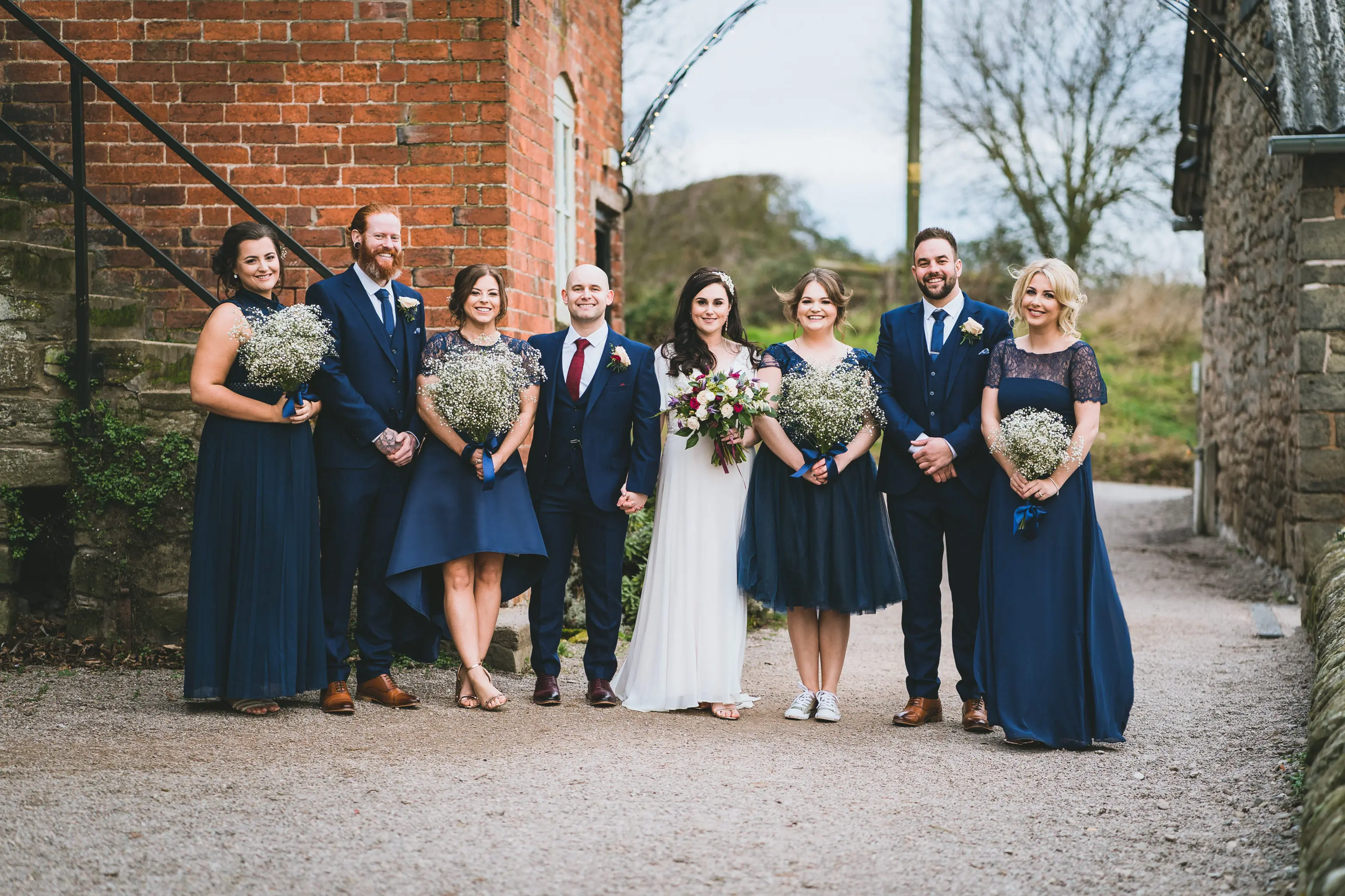 Lyde court wedding photographers during group photos