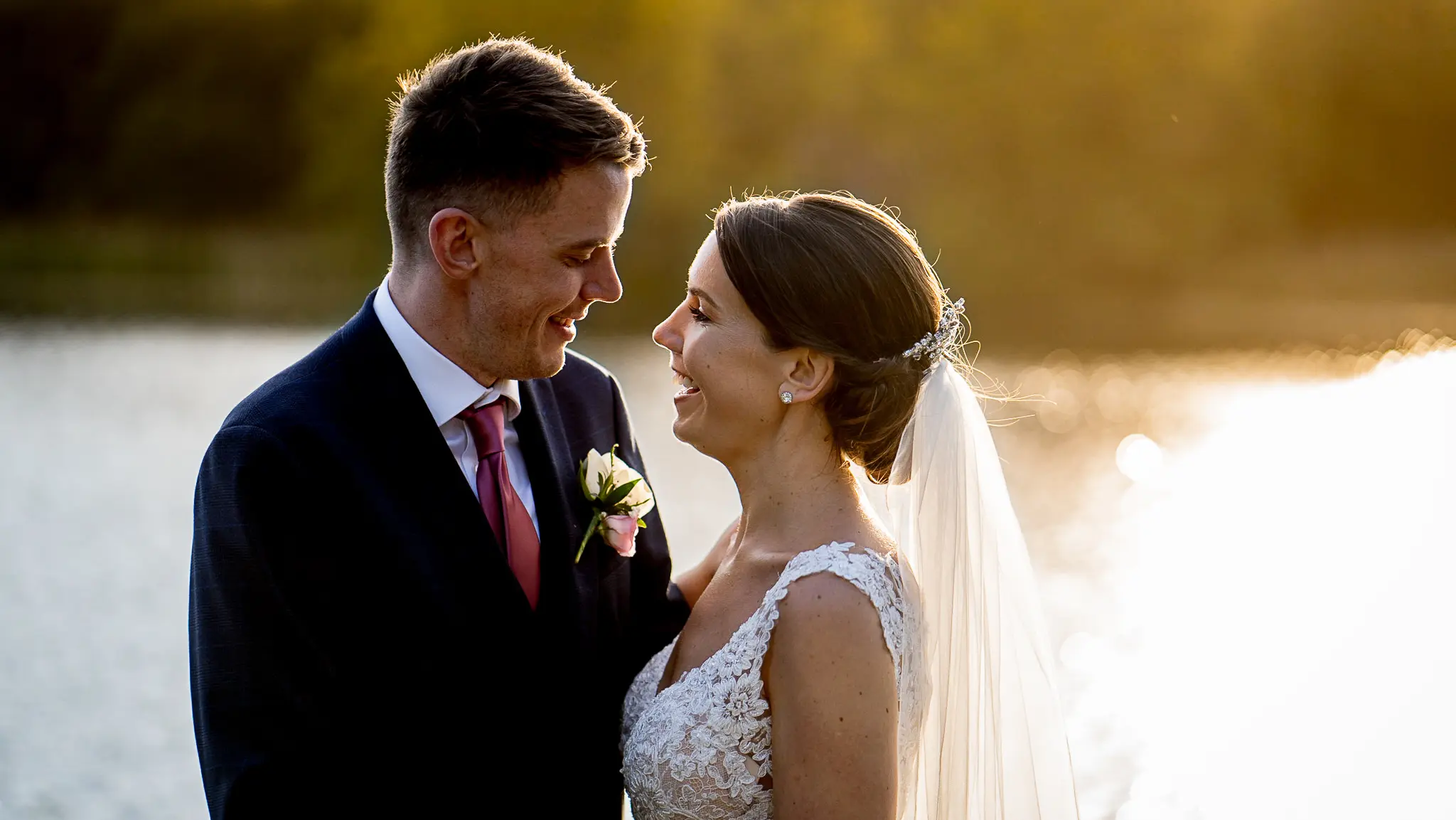Hensol Castle wedding photography of bride and groom at the jetty in the summer