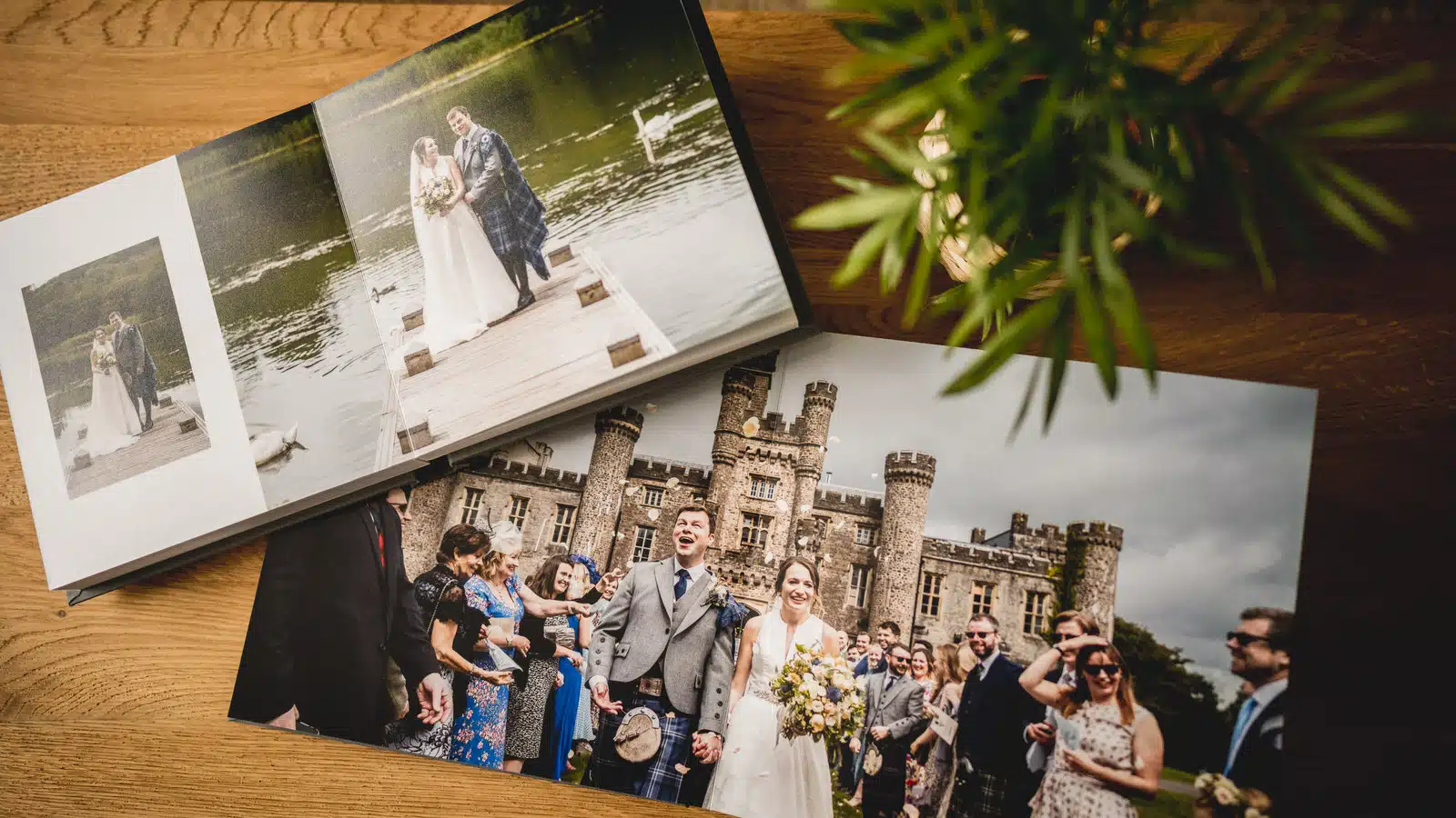 Open wedding album on a wooden table