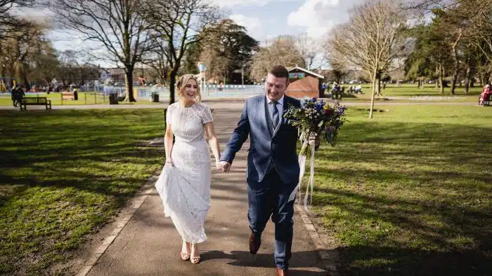 246-Wedding-Photography-at-Stone-Barn-Emma-Gavin-Lewis-Fackrell-Photography bride and groom walking through park