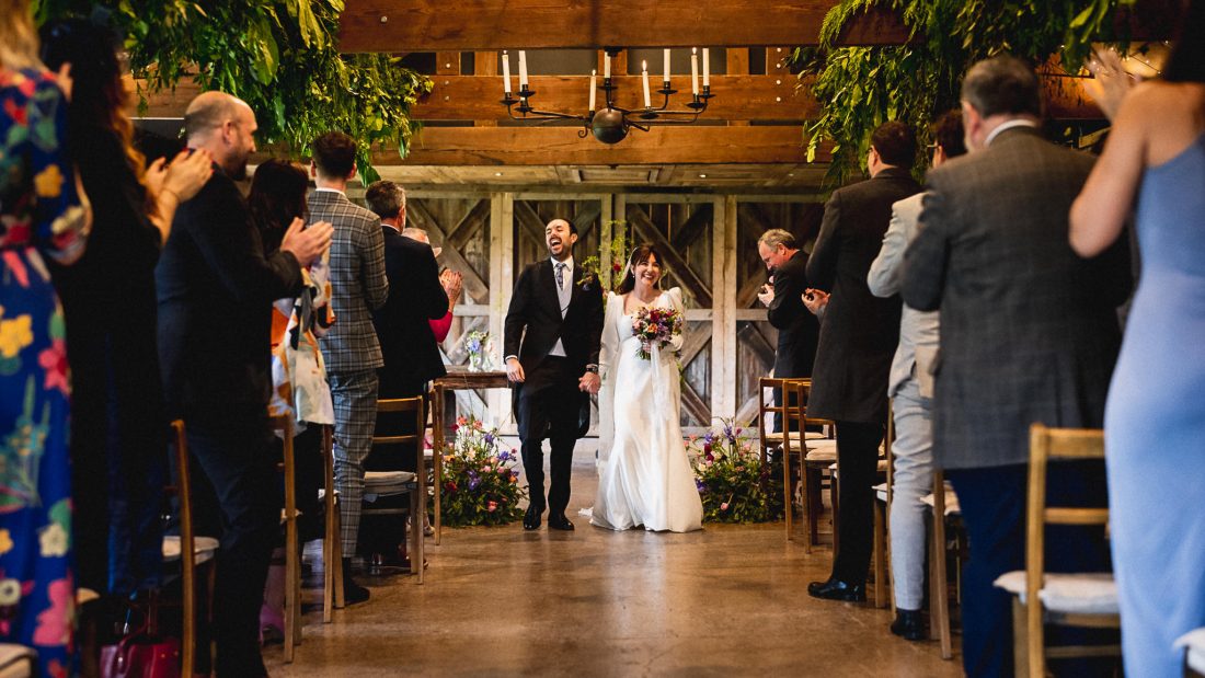 newly married couple in the wainhouse at Dewsall court photography