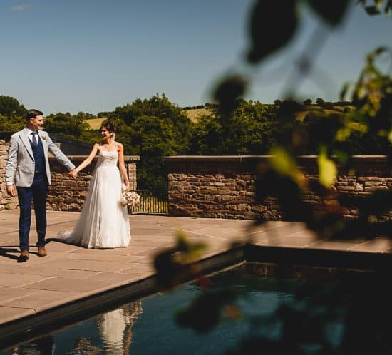 bride and groom in South Wales during their wedding day, walking around