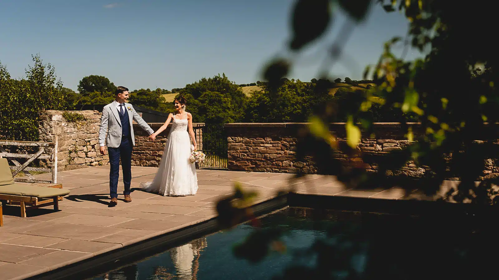 bride and groom in South Wales during their wedding day, walking around