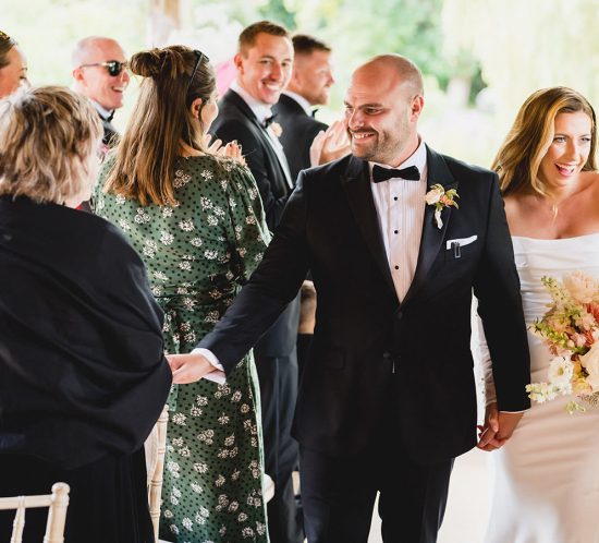 bride and groom moments after their wedding ceremony at Waddesdon