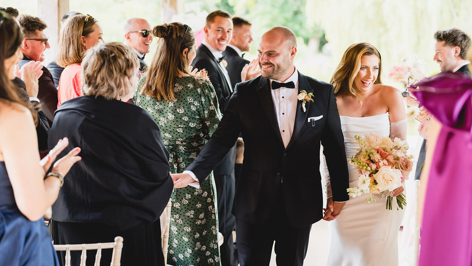 bride and groom moments after their wedding ceremony at Waddesdon