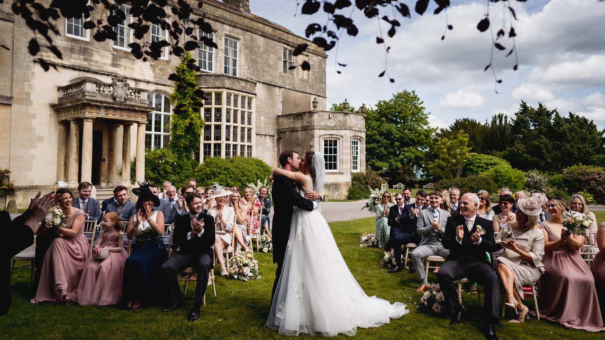 Outdoor ceremony on the lawn in front of Elmore Court