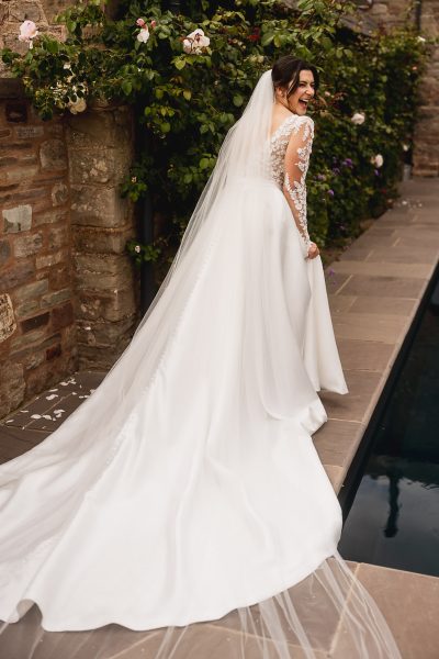 Llantilio House swimming pool bride portrait.