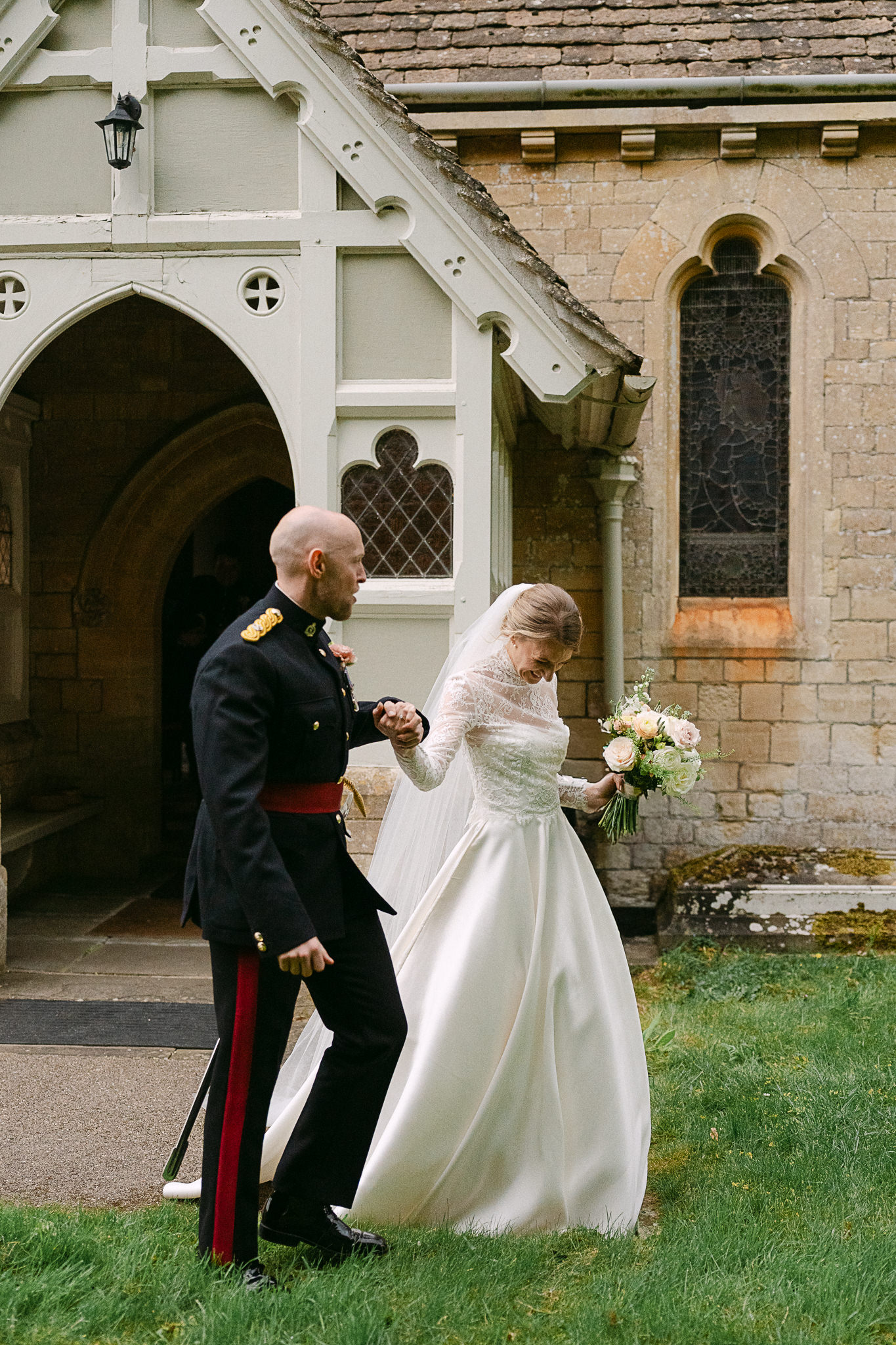 Couple outside the church before the barn