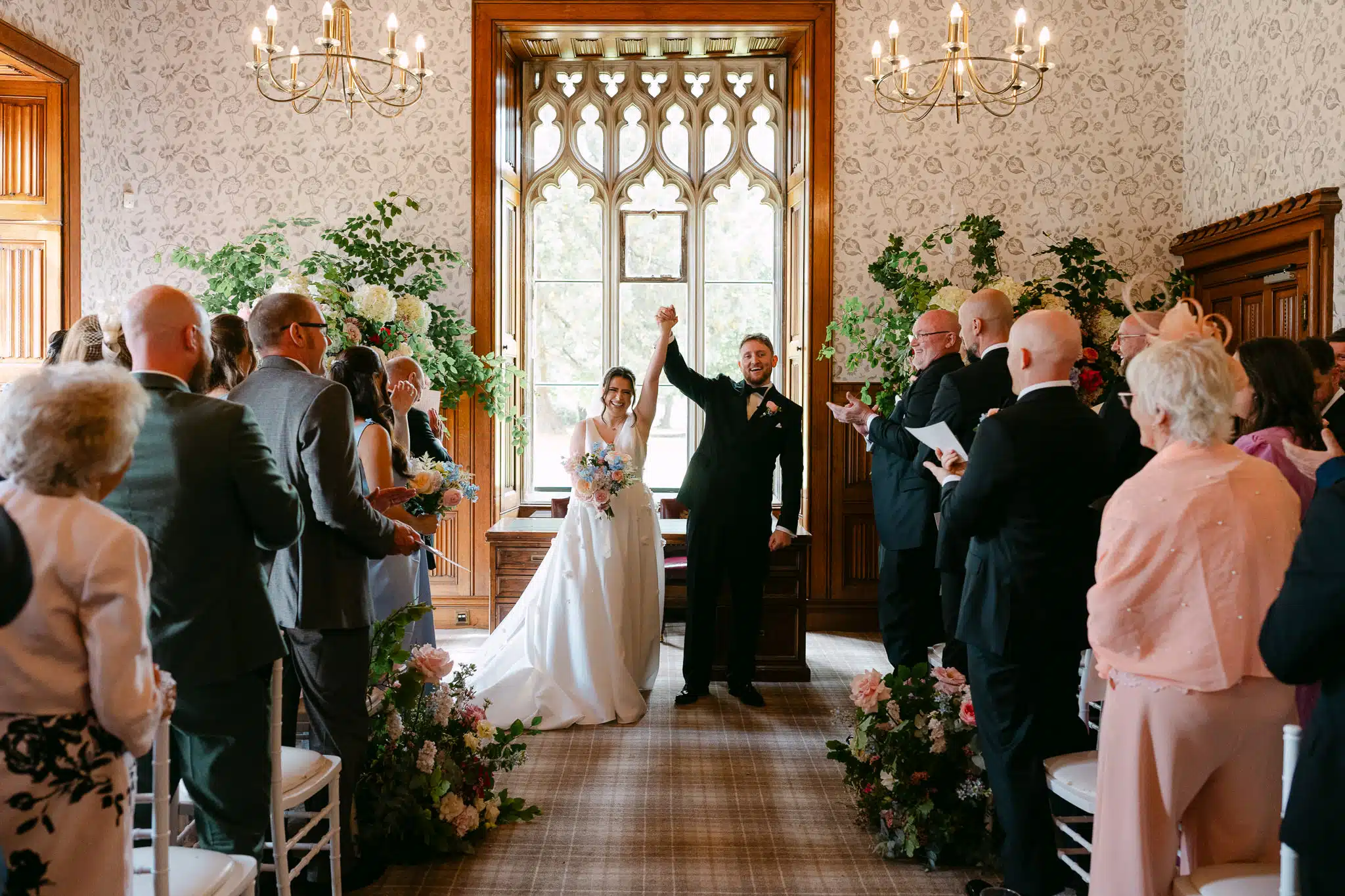 Hands in the air as the couple are announced married
