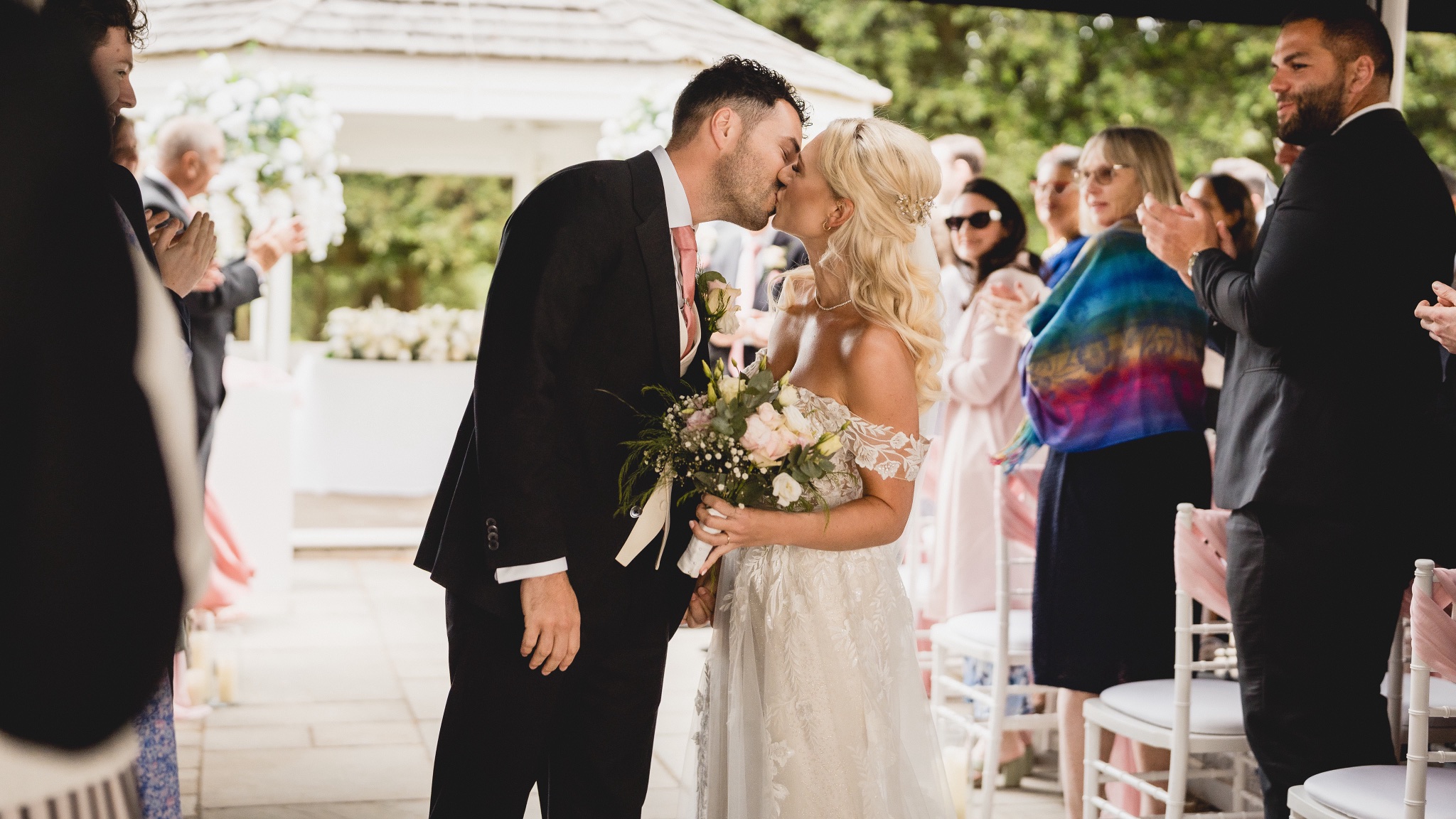 The first kiss under the pergola at Hensol Castle