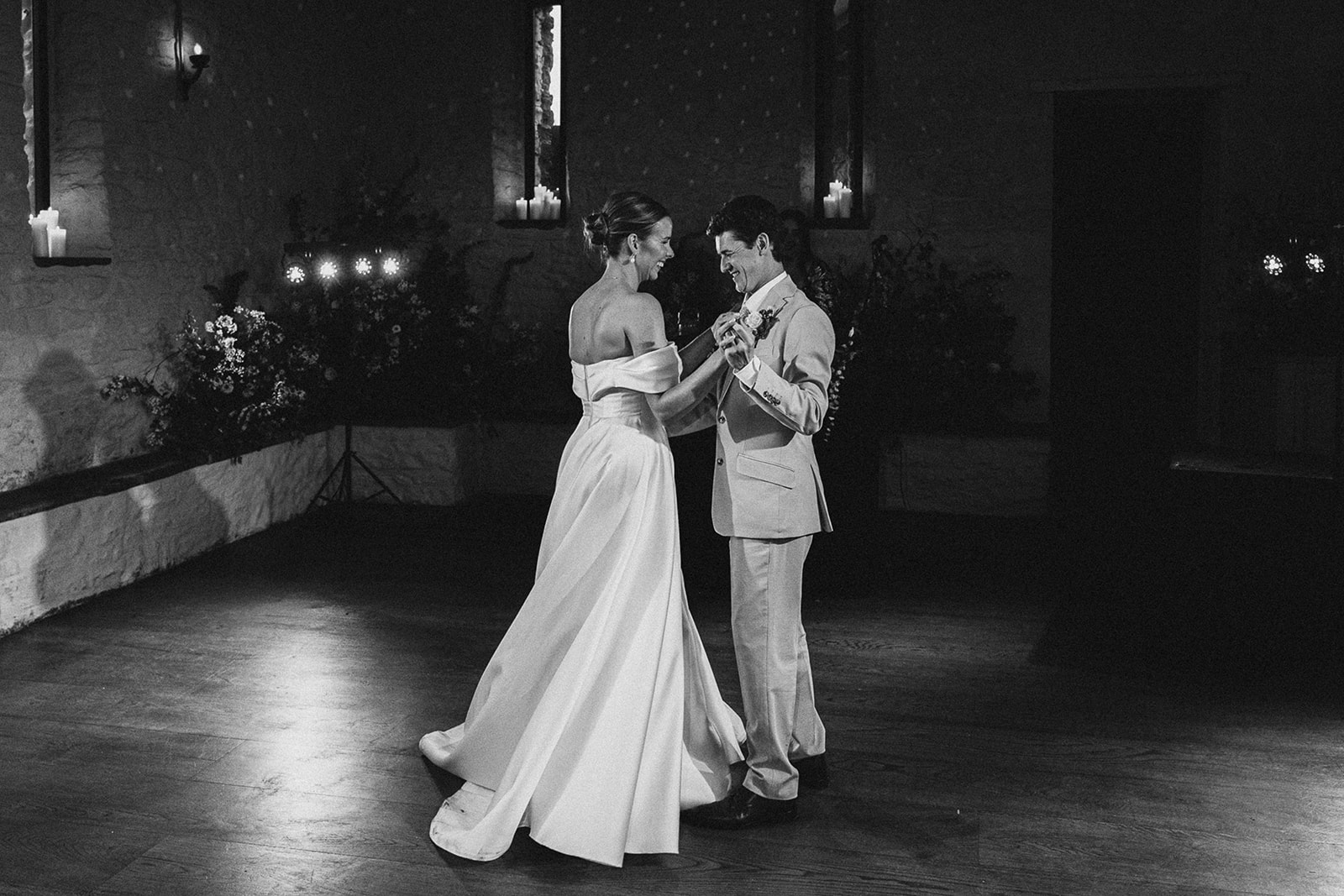 Olivia and Nathan’s first dance in the barn, in black and white