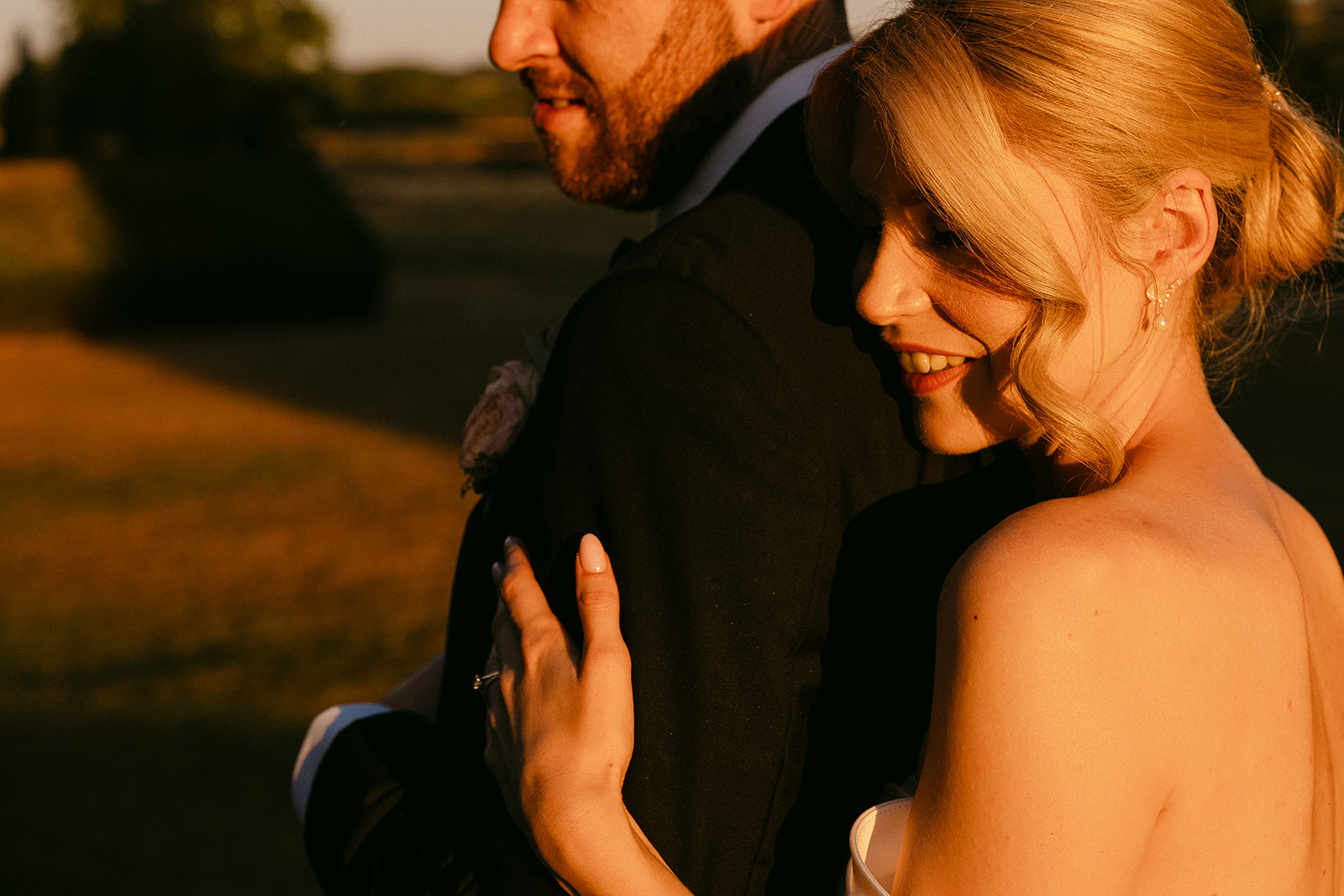 Kate and Dylan cheek to cheek in the low sun