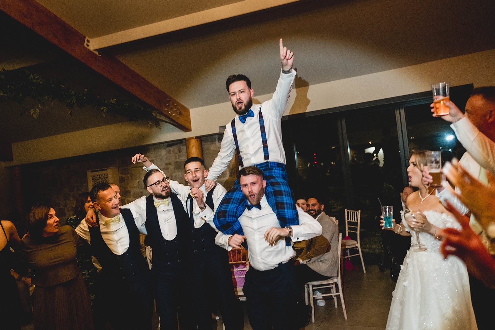 Jack lifted onto shoulders on the dance floor
