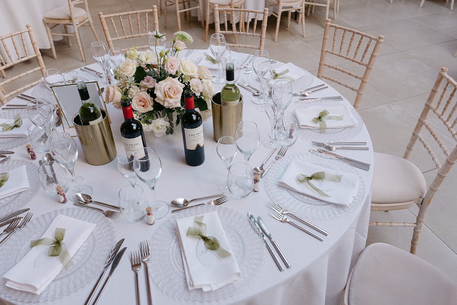 A table set for dinner with flowers and candles